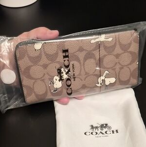 Coach X Peanuts Long Zip Around Wallet In Signature Canvas With Snoopy Print